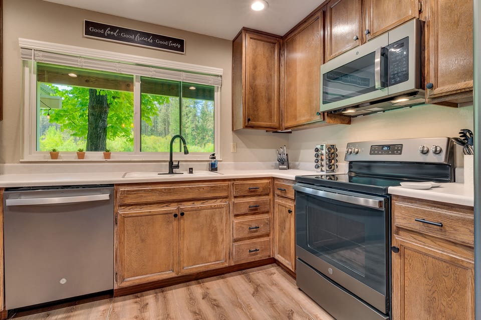 Enjoy beautiful views out the expansive kitchen windows while cooking your meals