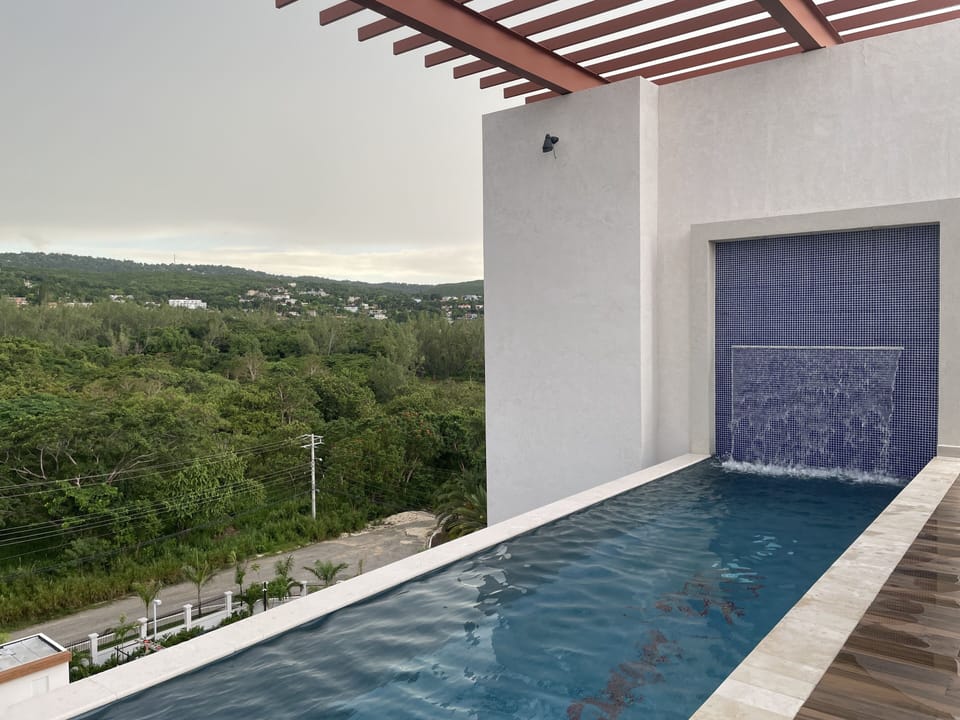 Infinity pool with reservoir.