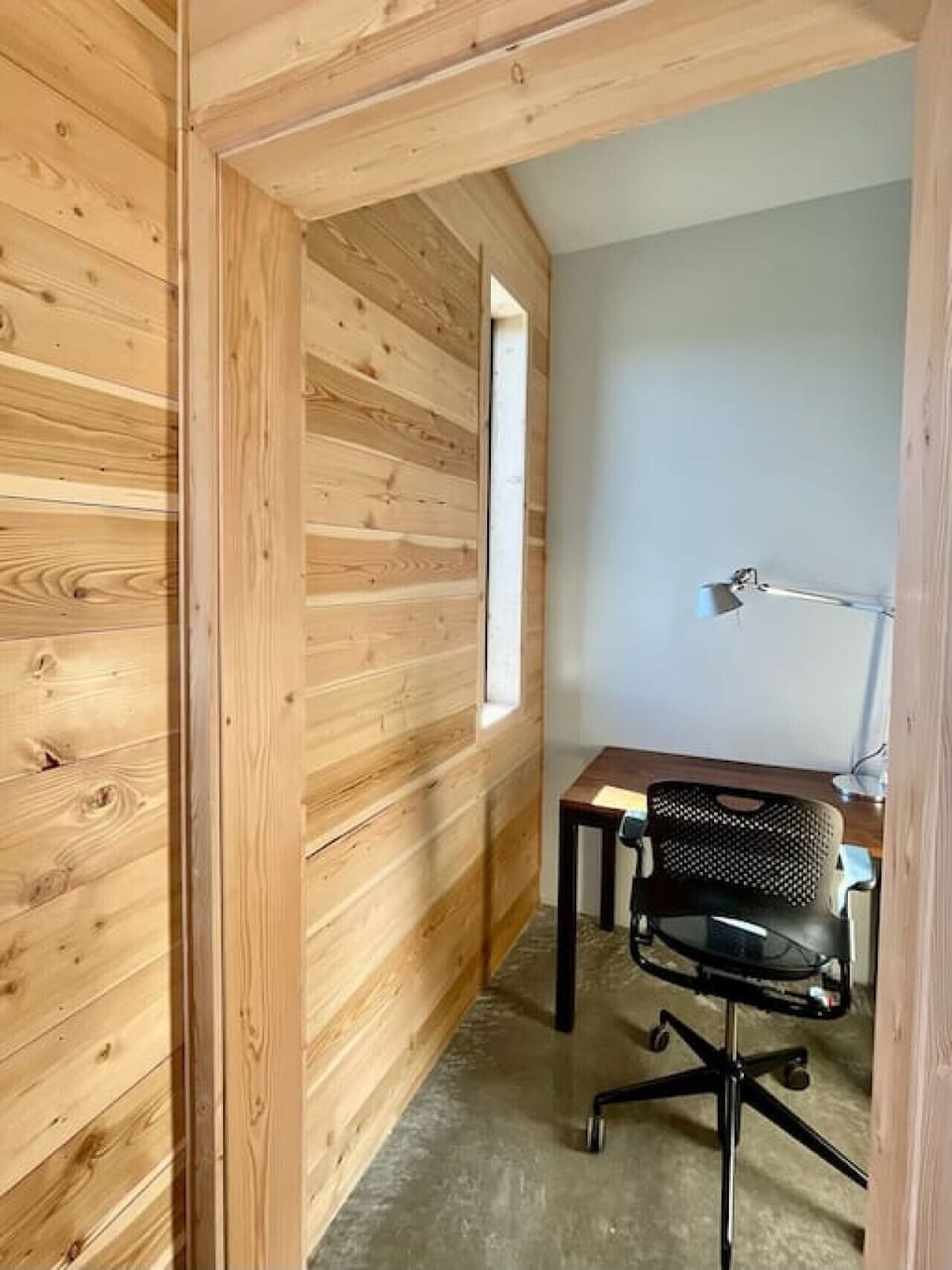 Zoom Room tucked around the corner of the bunk room with a desk, a window and strong wifi!