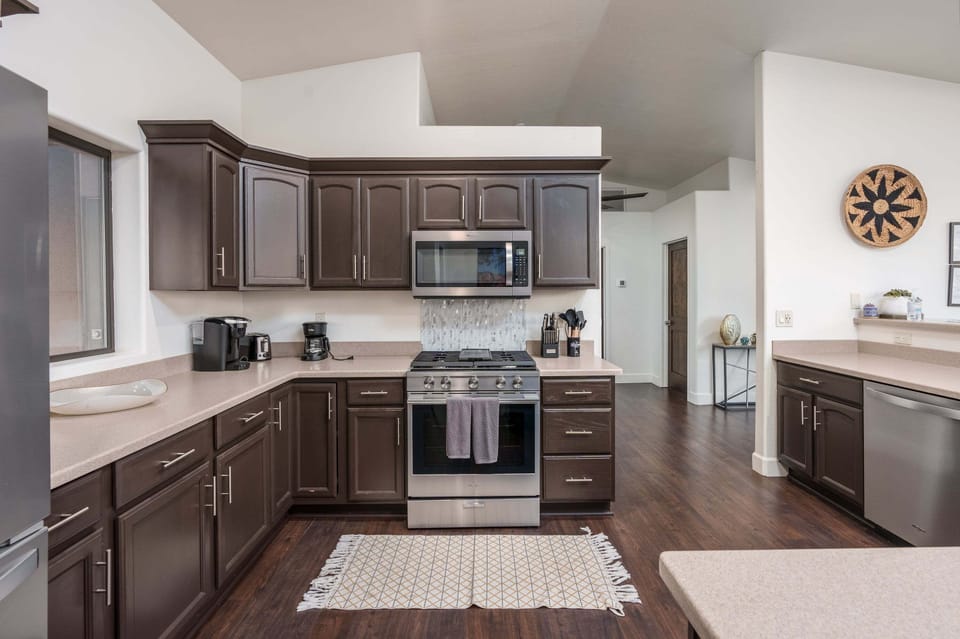 Whip up favorite meals in the fully equipped kitchen with ample counter space and modern appliances.