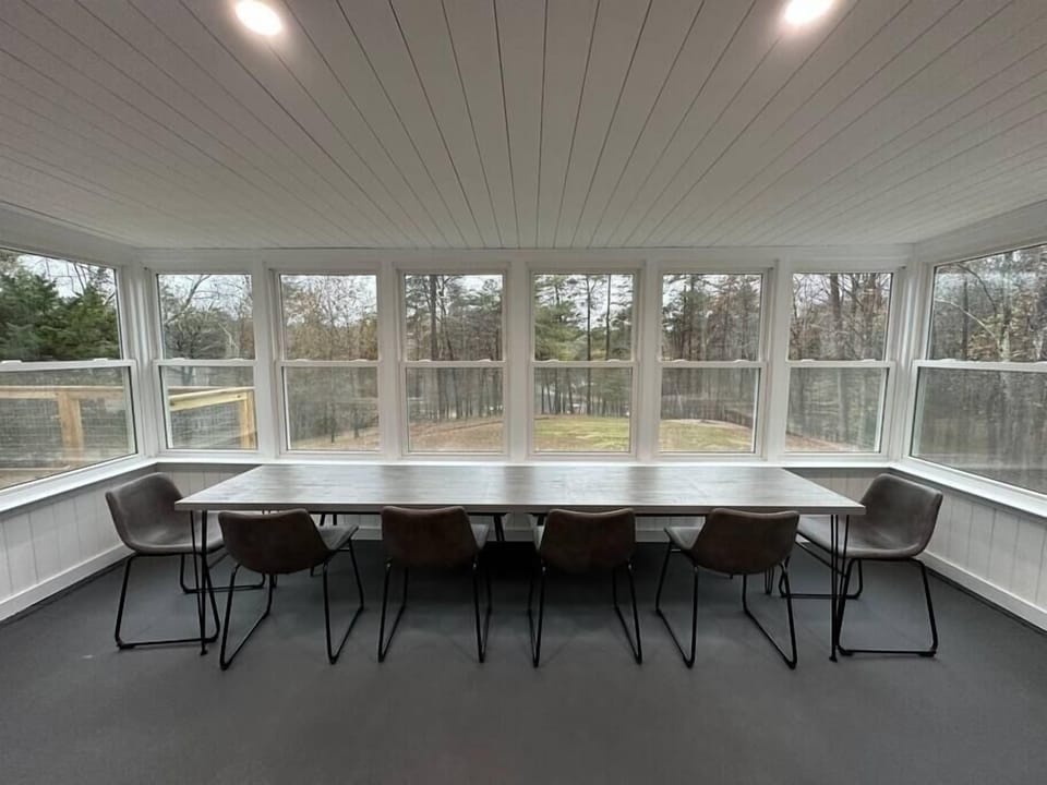 Dining table that seats 11+ with great views of passing wildlife and the lake