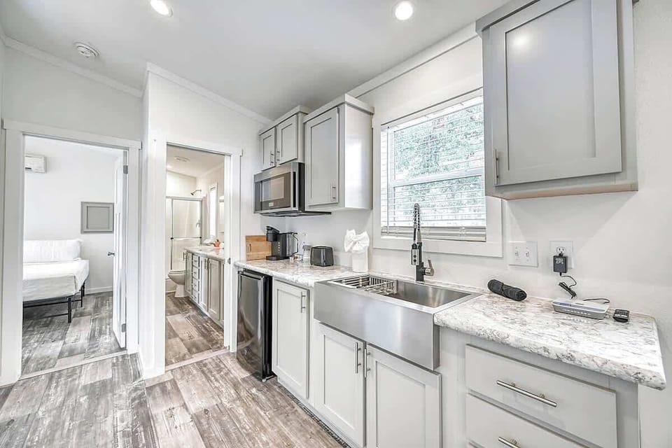 Kitchenette w/Sink, Microwave, Coffee Pot, and Mini Fridge