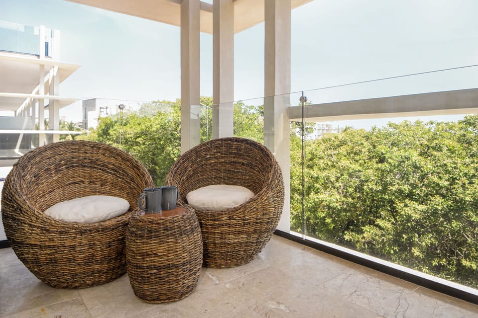 Private balcony with ocean and nature views