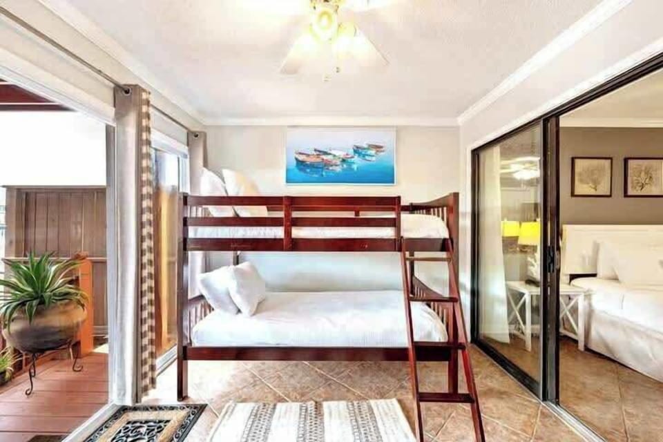 Walking directly through the master, is our bonus room, that offers one Twin bunk bed!