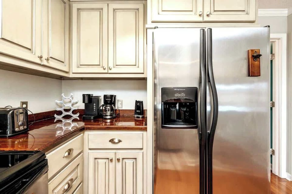 We've stocked this kitchen with full appliances, dishes, bake ware, pots & pans, silverware, utensils, crockpot, blender, and a traditional coffee maker & Keurig!