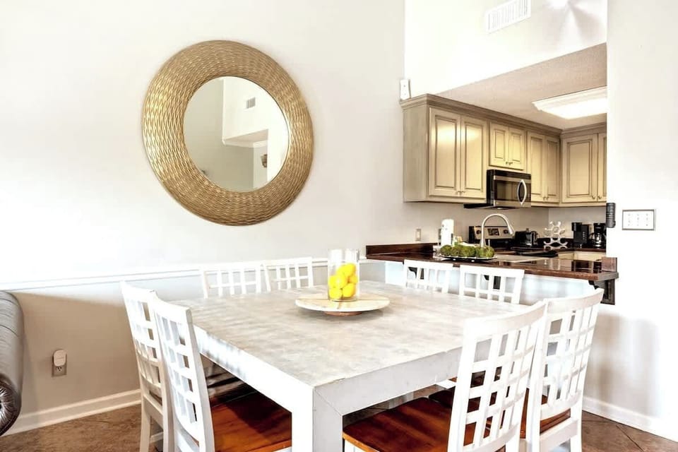 The dining area is open to the living room area, seating up to 8 around the large table together!