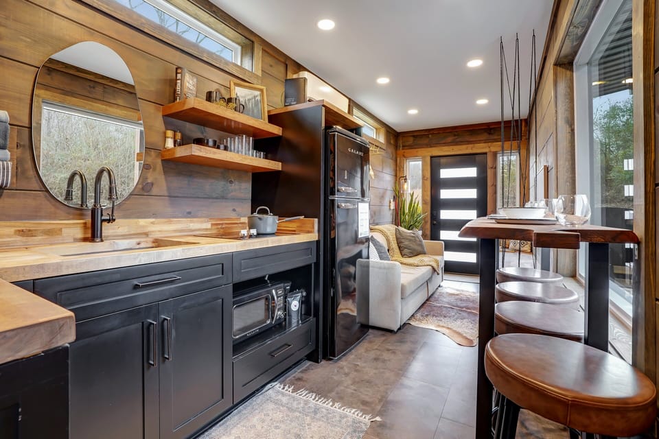 The interior and exterior of this shipping container was designed to hold all you can possibly need for an immersive and fully relaxing time!