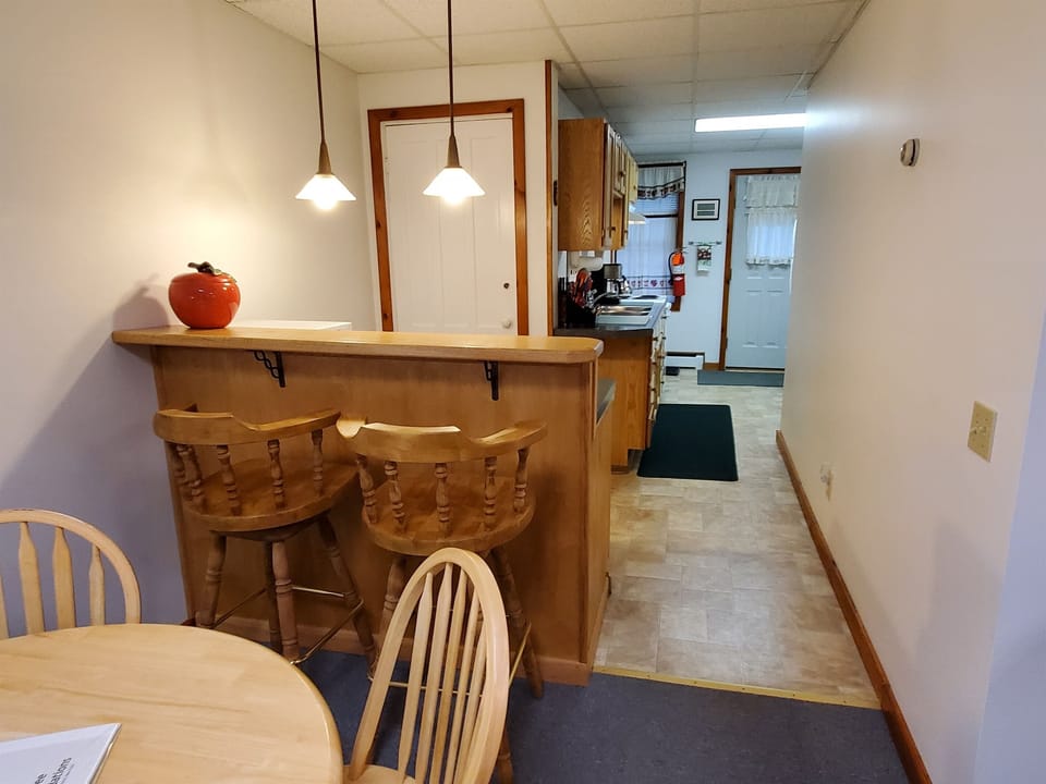 Dining area flows to kitchen area