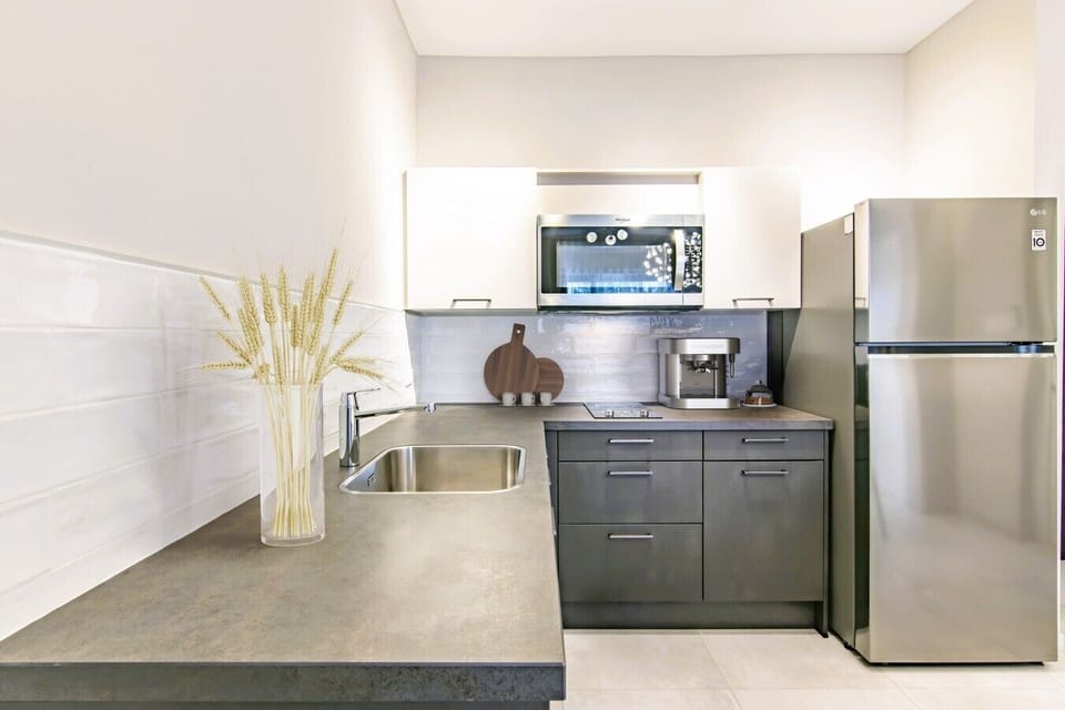 Enjoy preparing your favorite meals in this spacious modern kitchen
