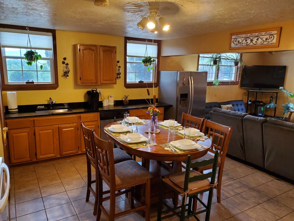 Open concept kitchen, dining, living areas