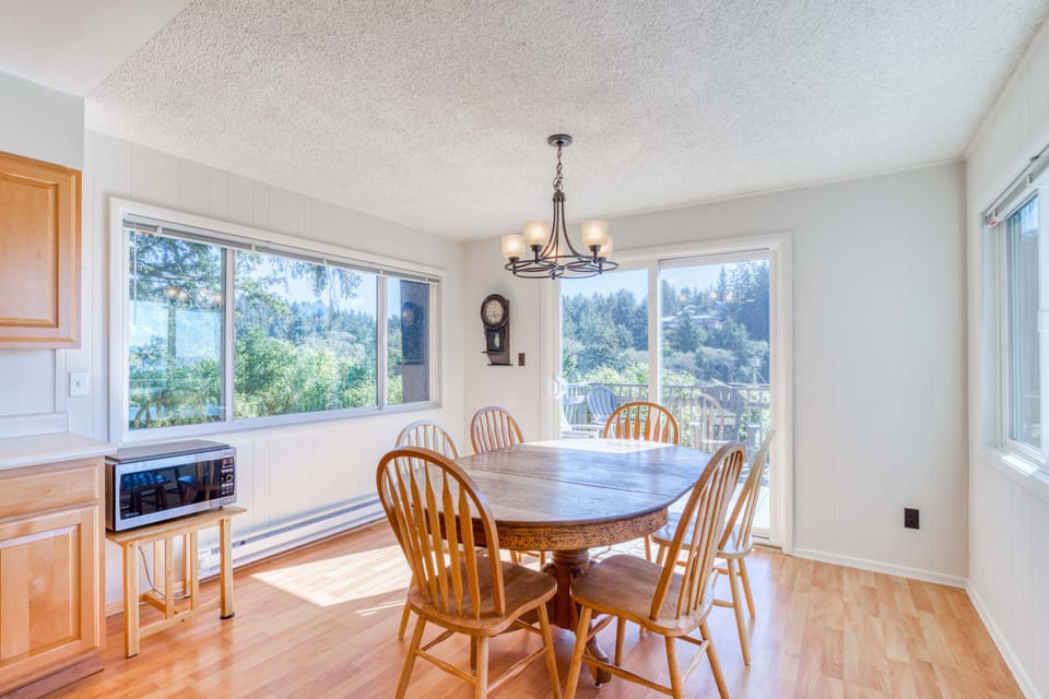Floor 2 Dining Area with Door to Outdoor Deck Access