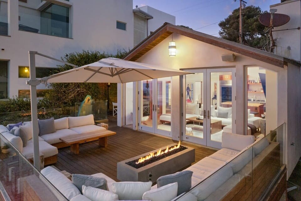 Gather around the outdoor fire pit with friends or family. 