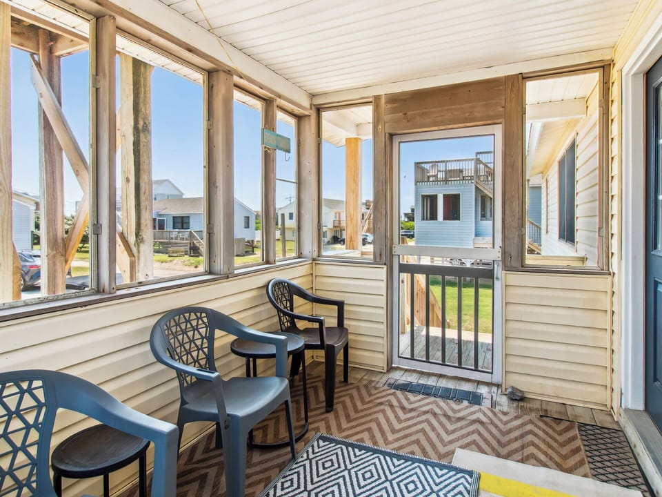 Enjoy coffee or drinks out on the Screened-In Porch.