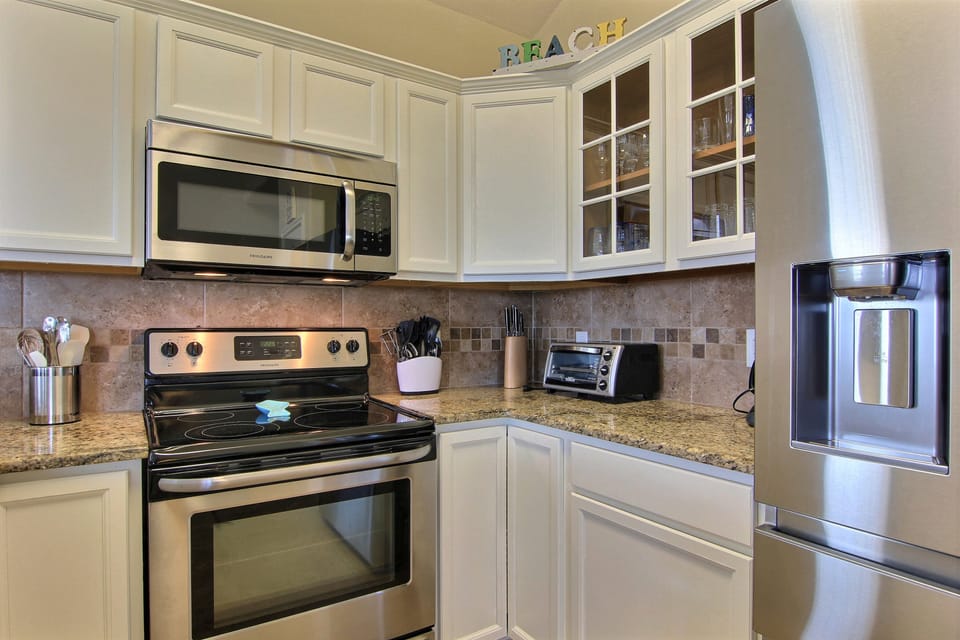 The Kitchen Will Bring Out Your Hidden Julia Child - Equipped with appliances, cookware, prep tools, and tableware, the open, expansive kitchen makes cooking a pleasure.