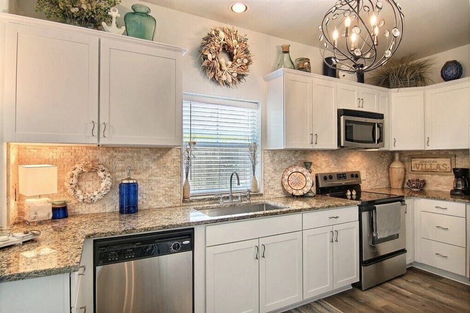 The lavish kitchen is fully equipped with everything you need to prepare and serve great food to your loved ones.