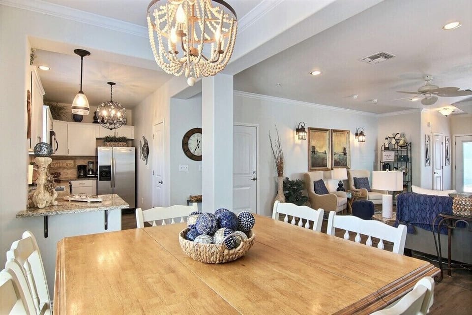 With the dining table conveniently located next to all of the action, it's easy to stay engaged with friends and family while grabbing a quick bite to eat.