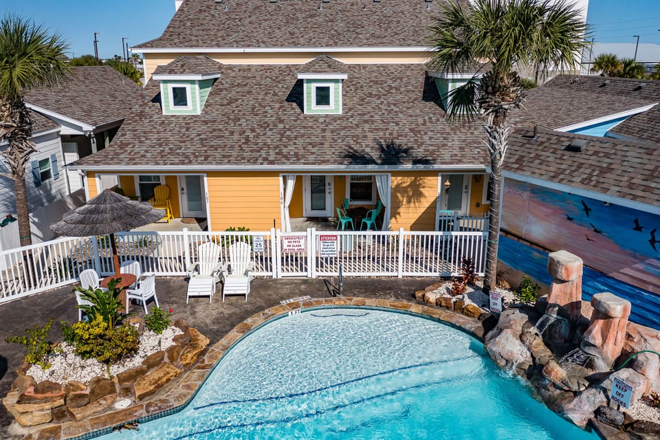 Enjoy Easy Access To The Pool Just Steps From Your Patio!