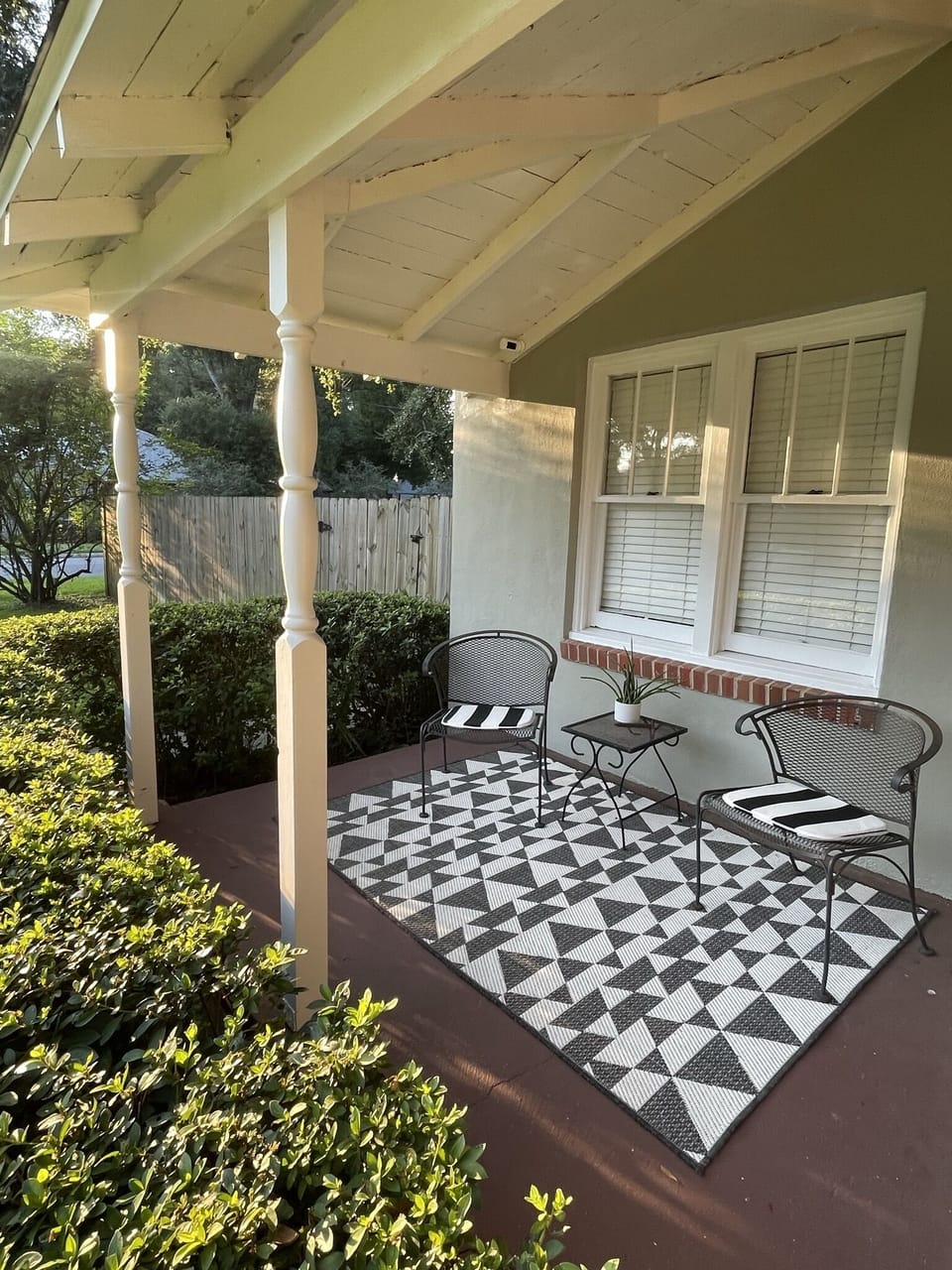 Step into history on our charming front porch in East Heights of Pensacola.