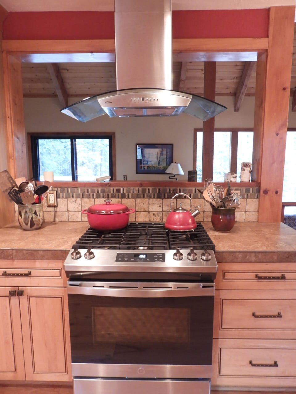 Kitchen opens to living room and dining area