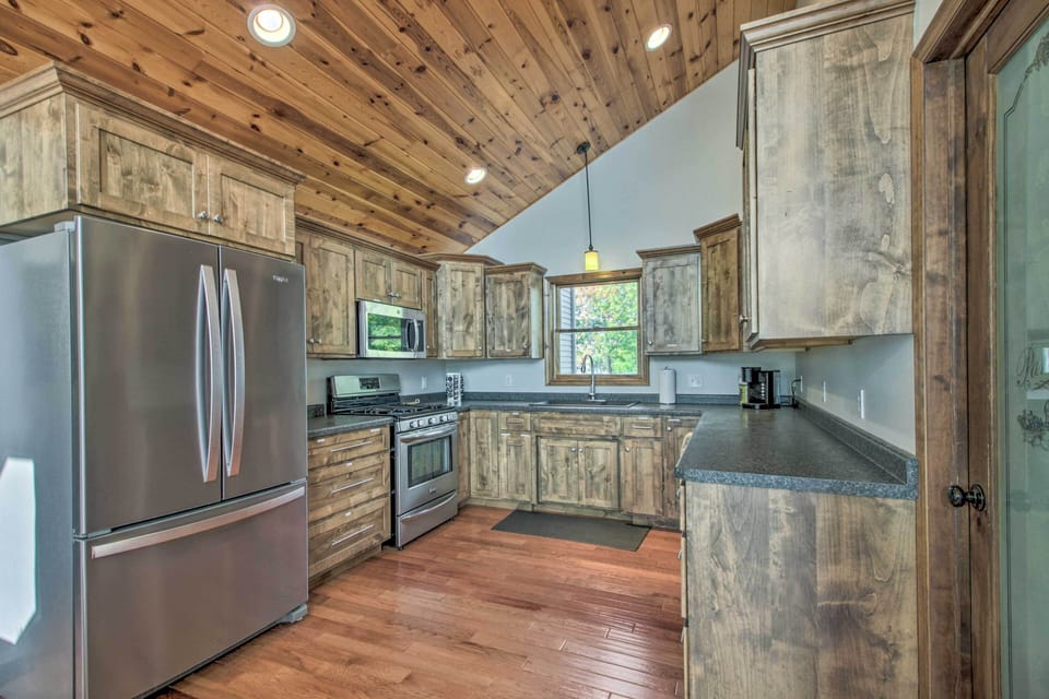 Kitchen | 3-Story Cabin | Pet Friendly w/ Fee | 1 Exterior Security Camera