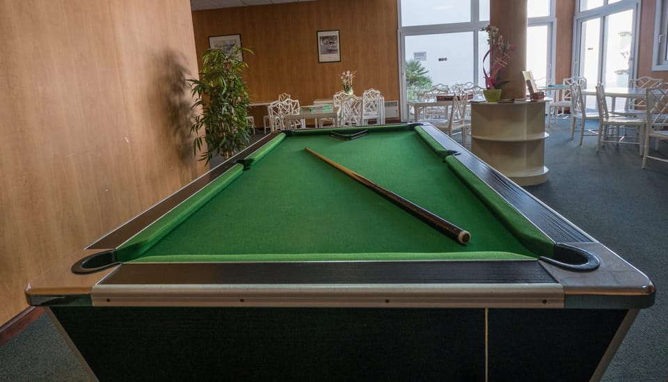 Play a fun game of billiards in the games area