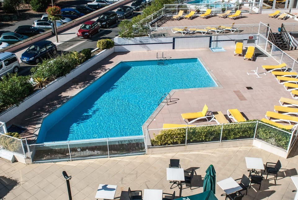 The outdoor pool is the perfect place to share some laughs with friends and family