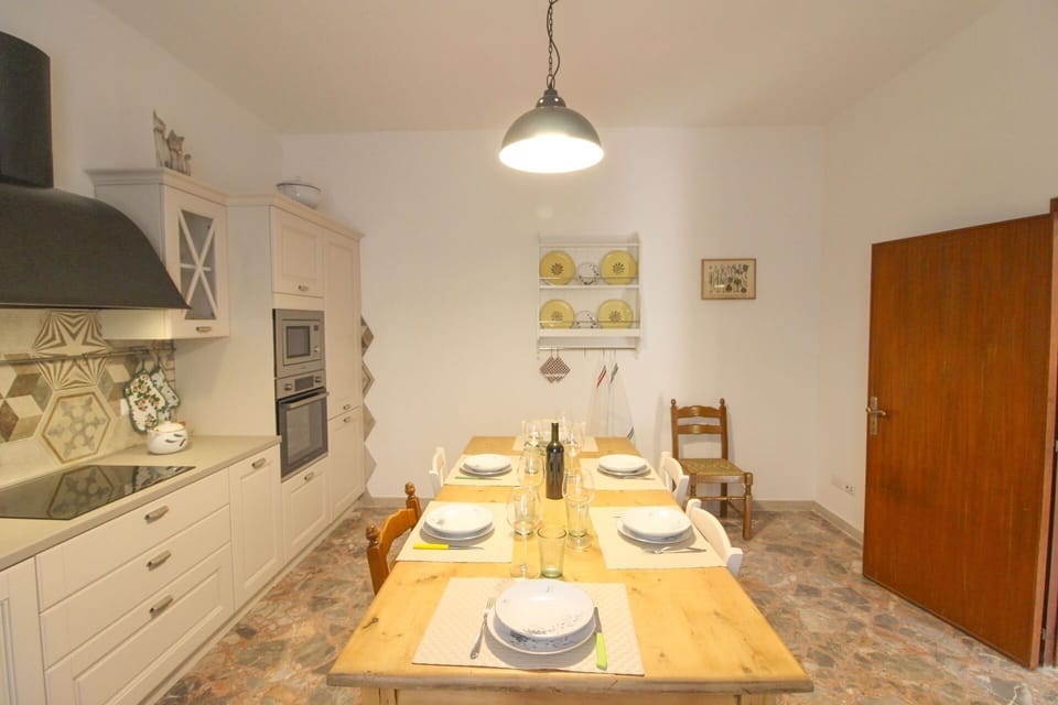 Furniture, Interior Design, Flooring, Floor, Wood, Ceiling, Room, Lighting, Light Fixture, Chair
