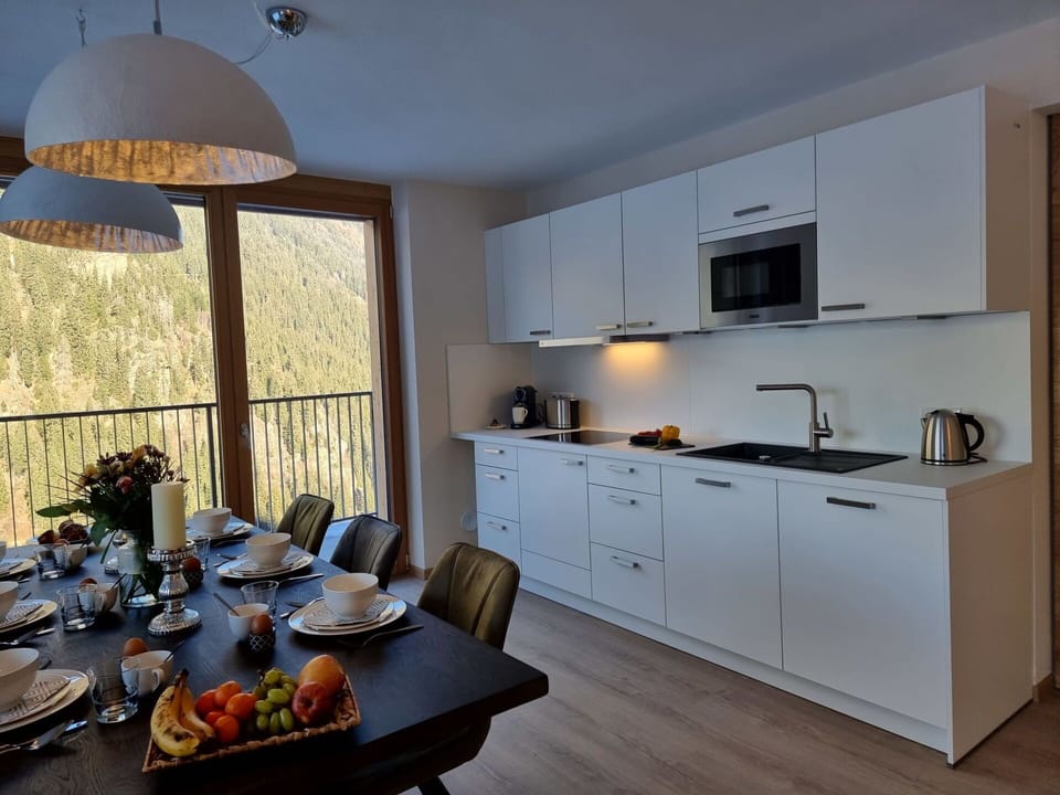 Cabinetry, Furniture, Property, Countertop, Table, Wood, Kitchen, Interior Design, Tableware, Floor