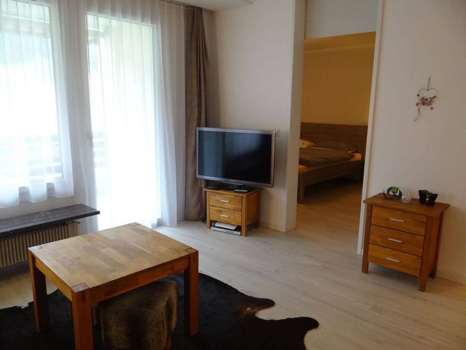 Table, Furniture, Property, Cabinetry, Window, Wood, Drawer, Television, Comfort, Interior Design