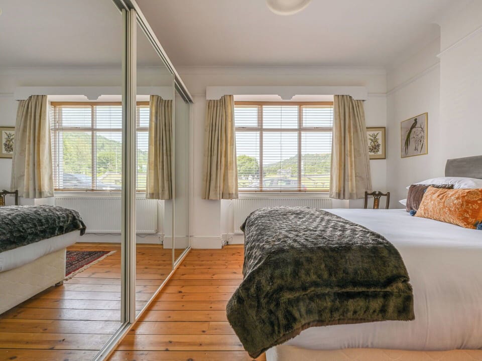 Furniture, Interior Design, Bed, Flooring, Floor, Bedroom, Ceiling, Wood, Room, Bedding