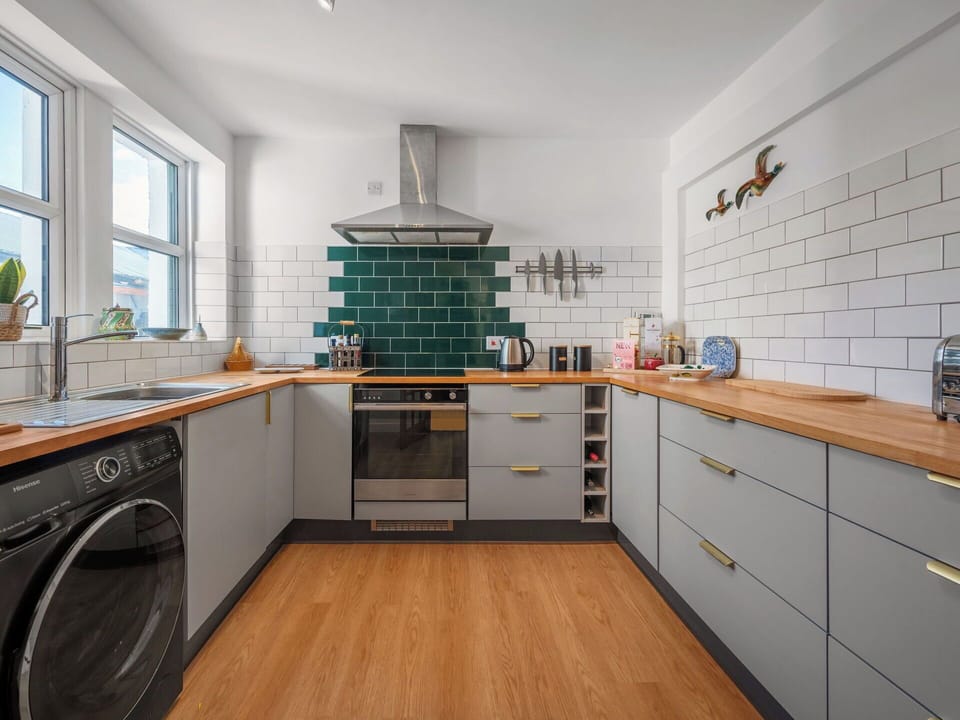 Kitchen, Kitchen Appliance, Major Appliance, Interior Design, Flooring, Countertop, Cabinetry, Floor, Home Appliance, Kitchen Stove