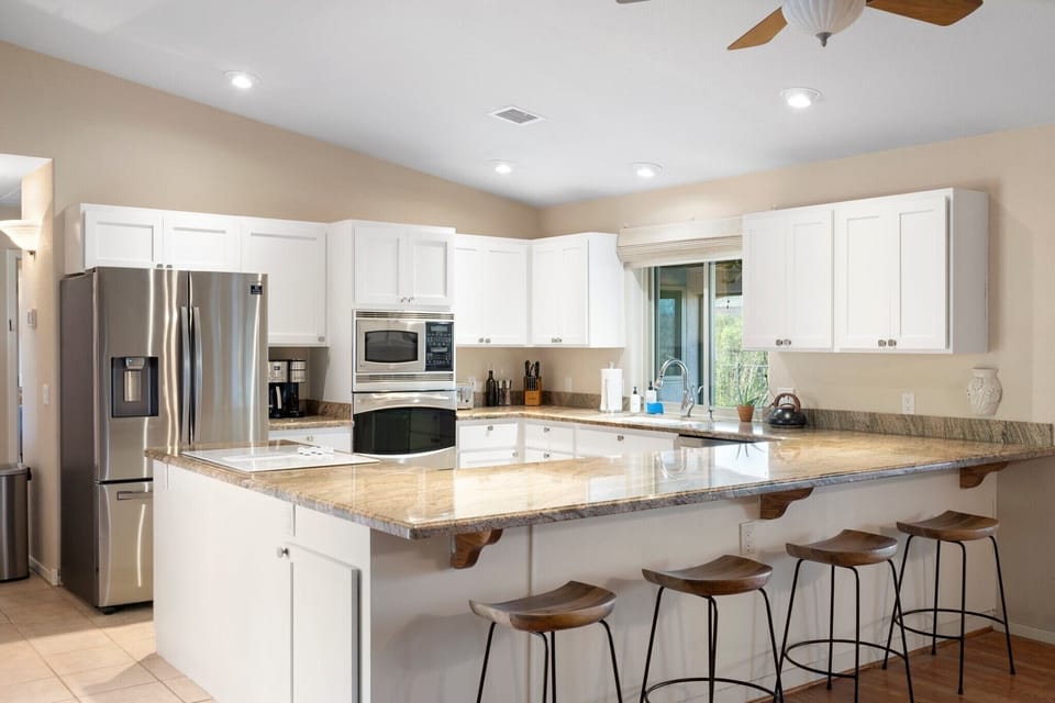 Kitchen is fully stocked with coffee, tea and all the cooking essentials.