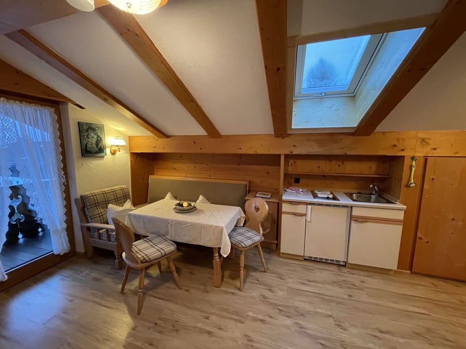 Table, Furniture, Cabinetry, Wood, Chair, Lighting, Window, Building, Interior Design, Flooring