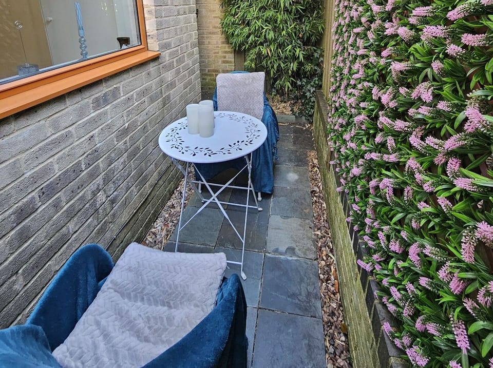 Small patio at the rear of the house: a private place to sit out