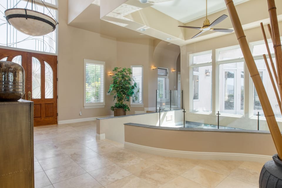 Incredible design with an indoor/outdoor koi pond near the entrance.