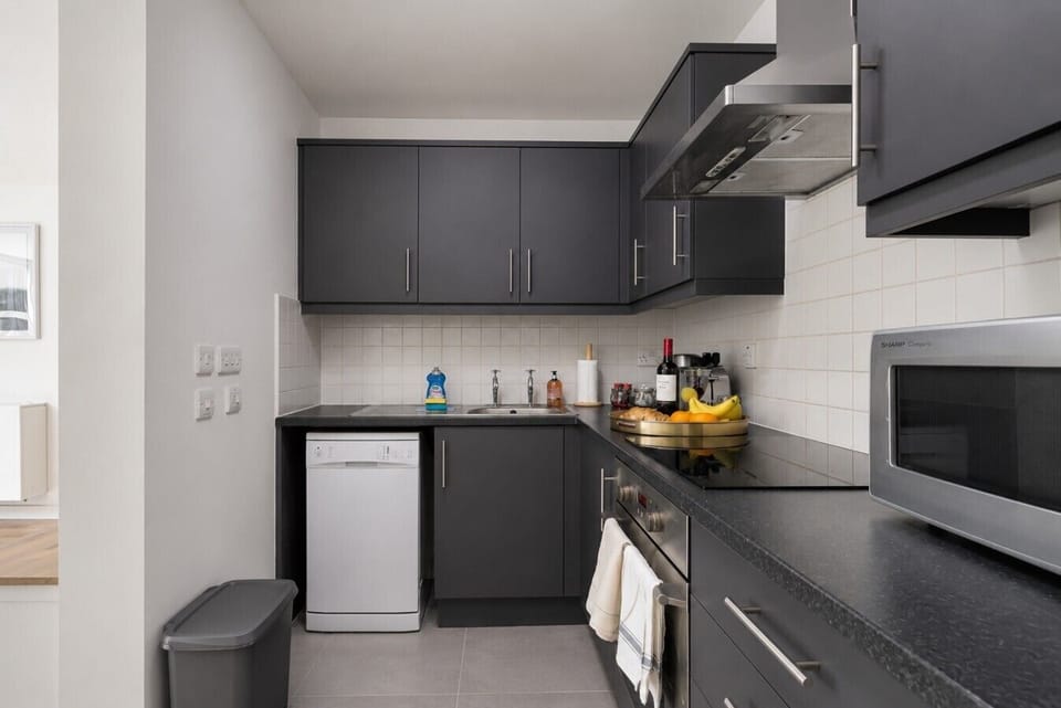 A fully equipped kitchen with everything you need to prepare a home cooked meal.