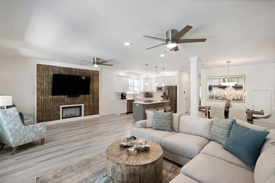 Open living, kitchen, and dining space