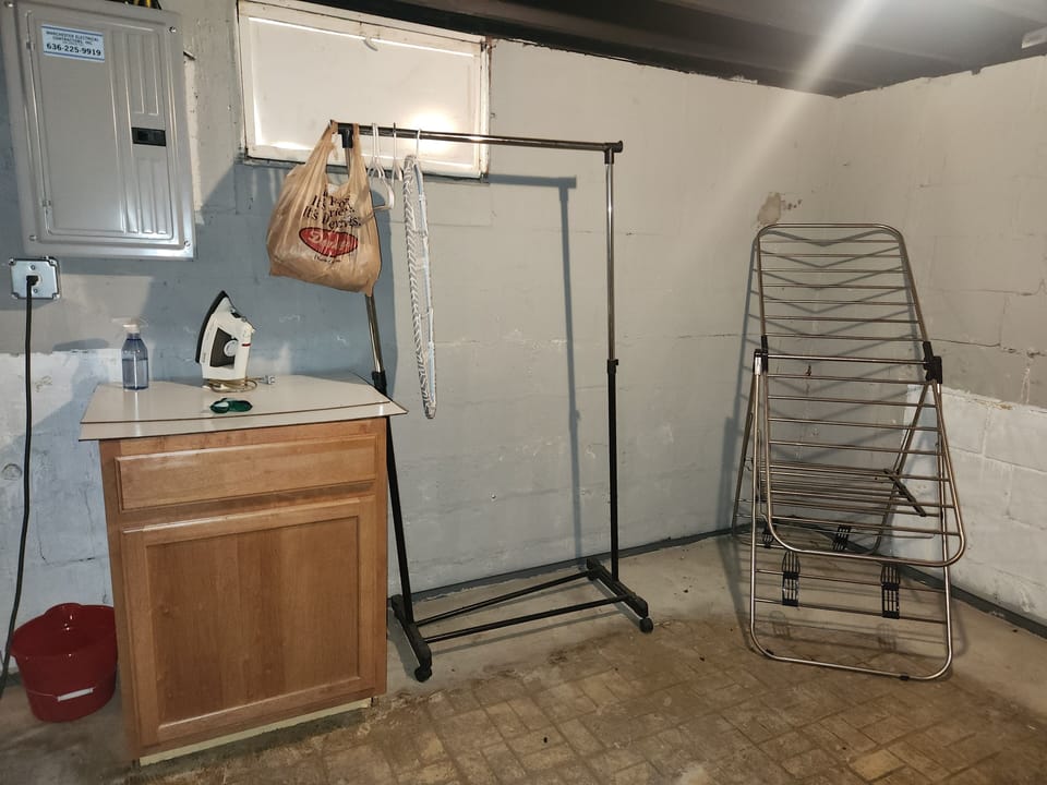 Iron, ironing board, and drying station