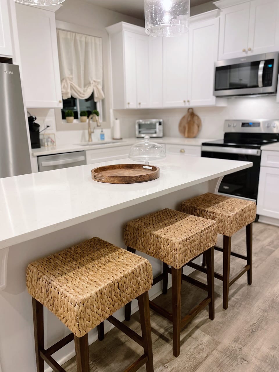 Kitchen with island seating for 3. 