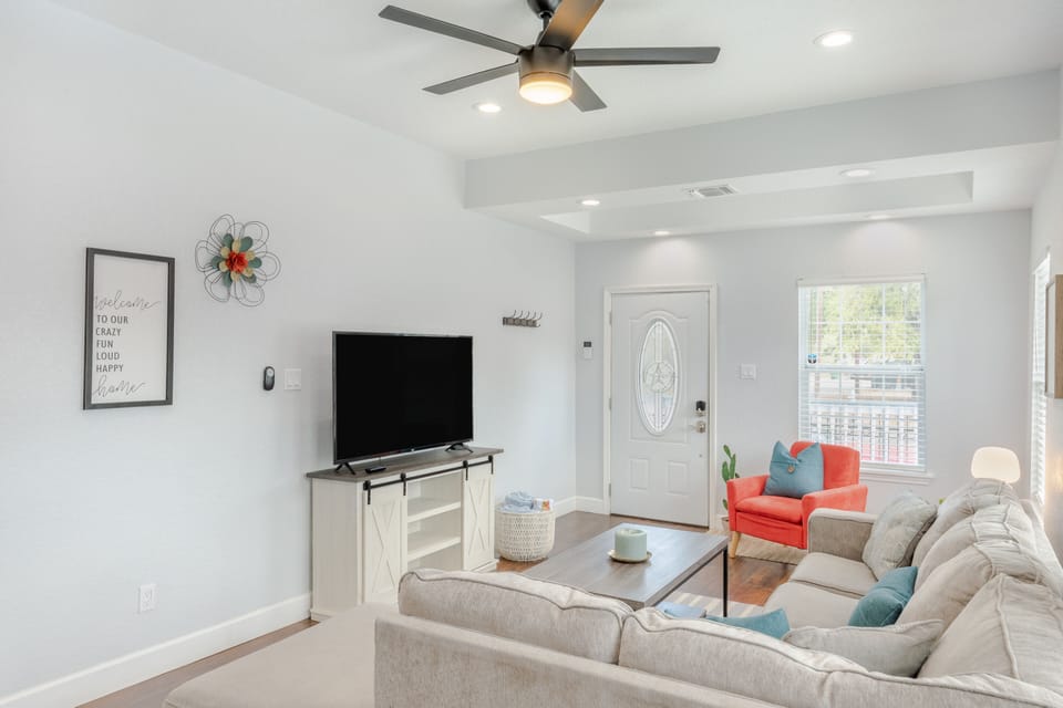 Living room with ROKU tv and sleeper sofa