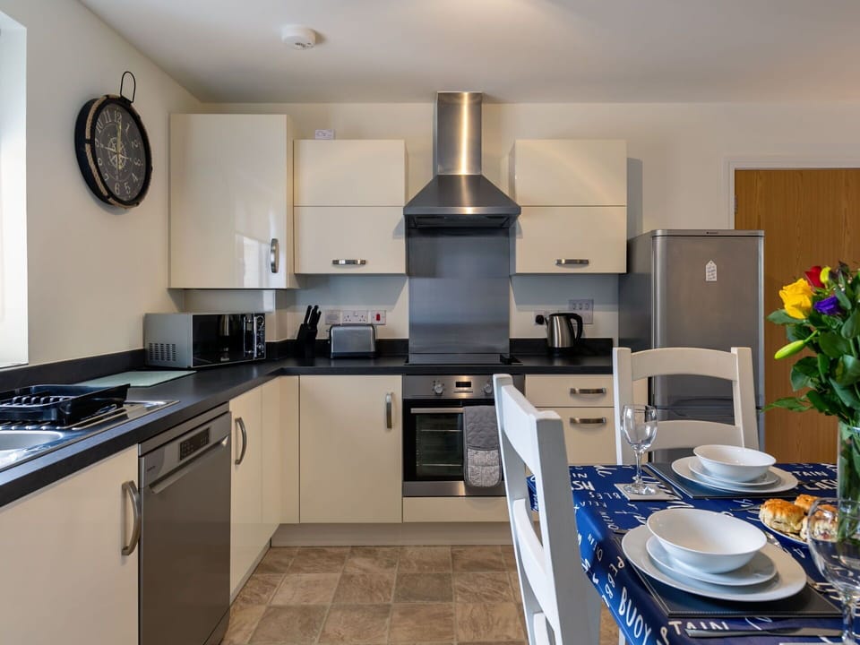Countertop, Cabinetry, Furniture, Kitchen Sink, Sink, Kitchen Stove, Kitchen, Kitchen Appliance, Home Appliance, Tap