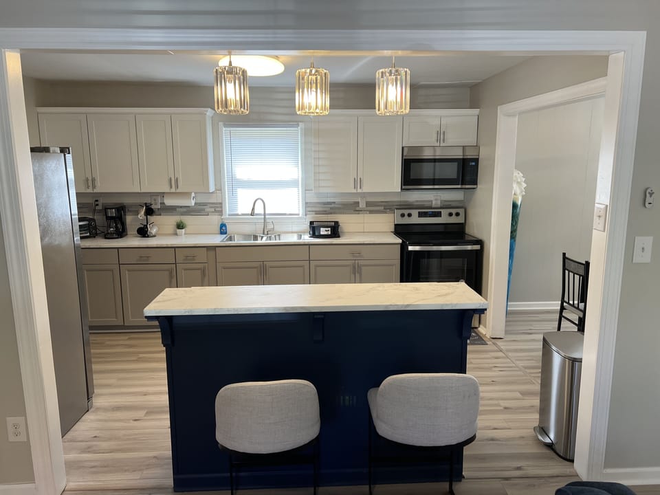 Ample counter space is available including a marble island counter