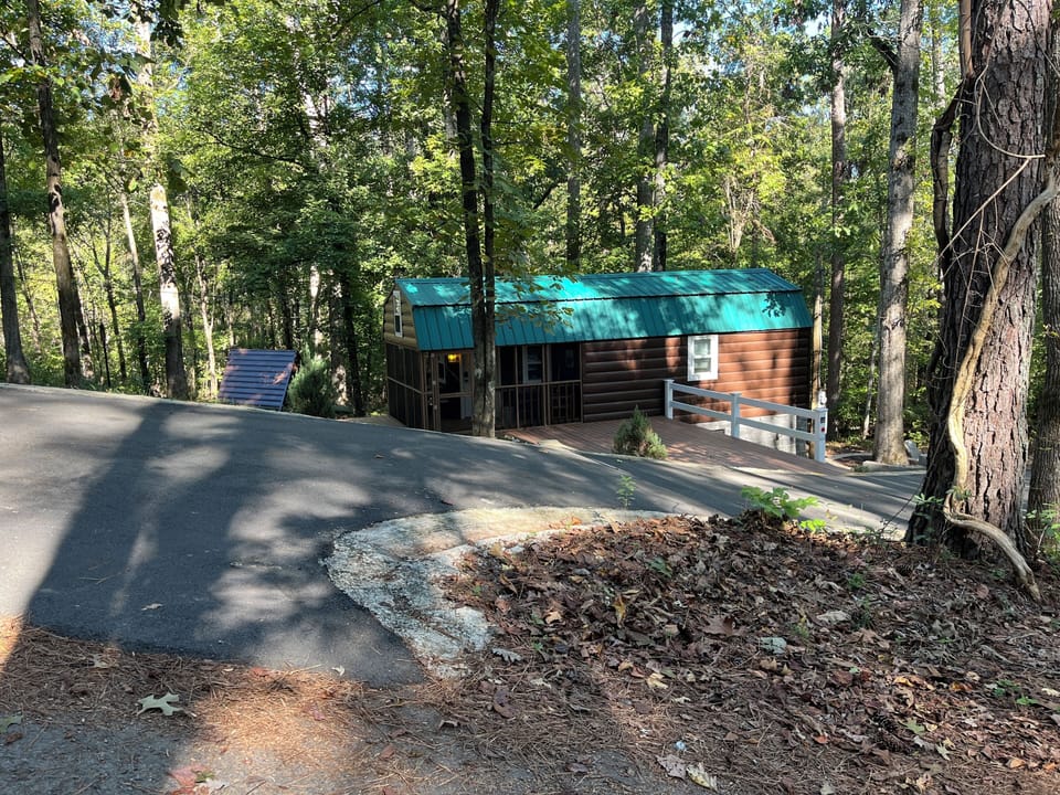 Outside view of cabin and longest part of driveway