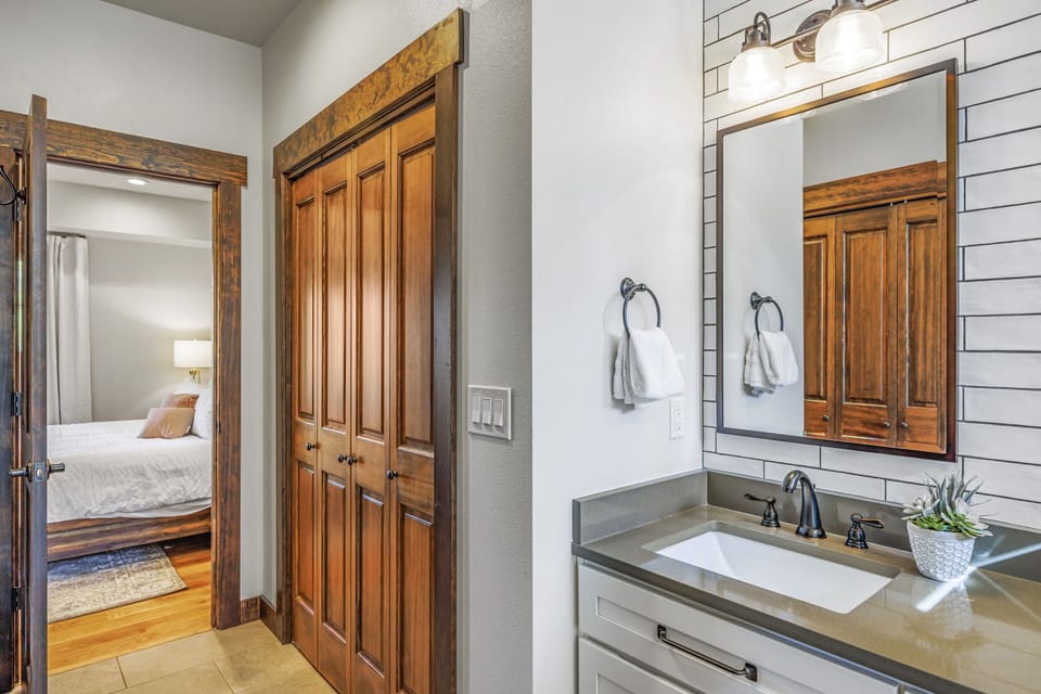 Bedroom 1 Master En Suite Bathroom with a shower