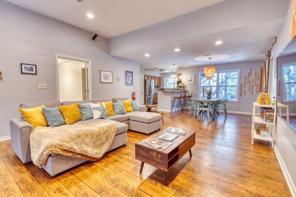 Living area with the utility room in the background. 