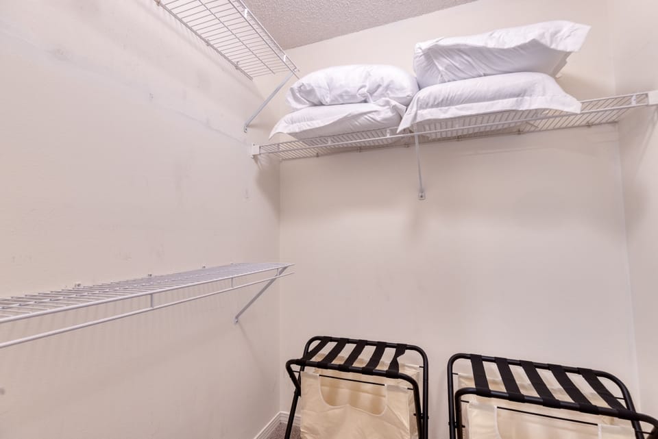 Bedroom #3 walk-in closet has plenty of storage for your items.