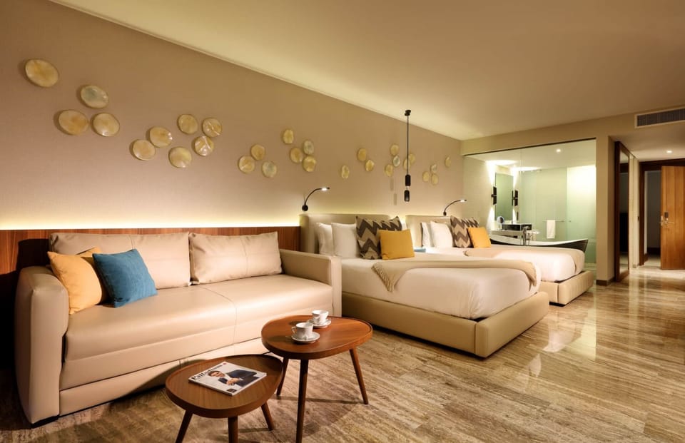 Junior suite Two queen beds and sofa bed