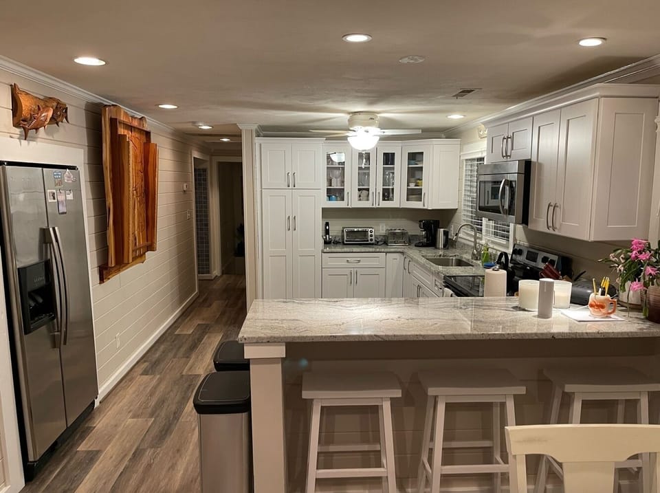 Kitchen with countertop seating area
