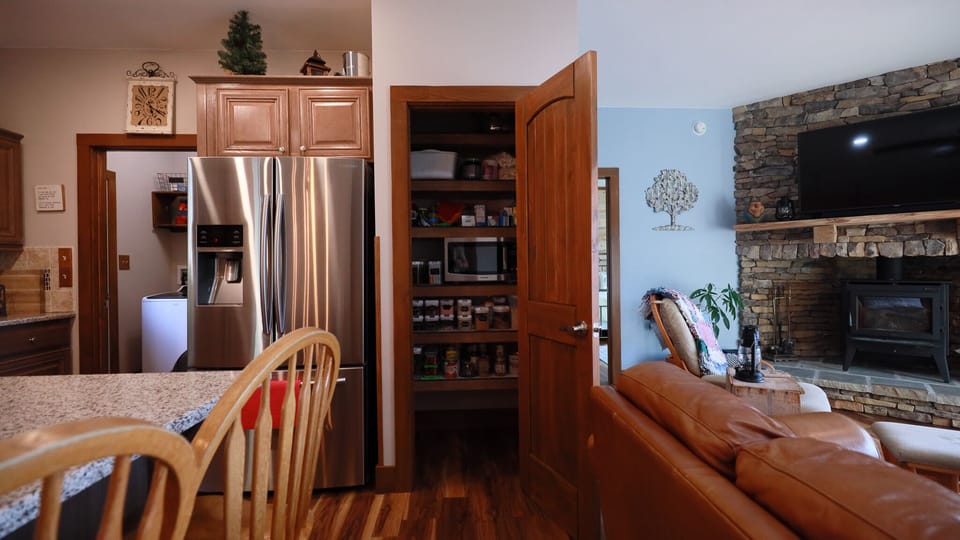 Microwave in pantry.  Food not included. Washer and dryer in the back left.