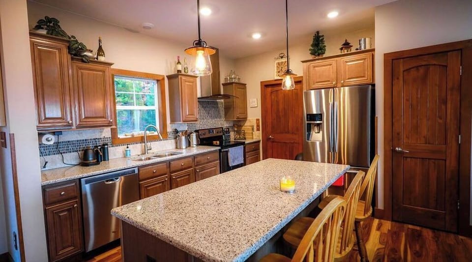 The quartz Island and kitchen of the Mountain Oasis home.